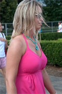 blonde in hot pink blouse